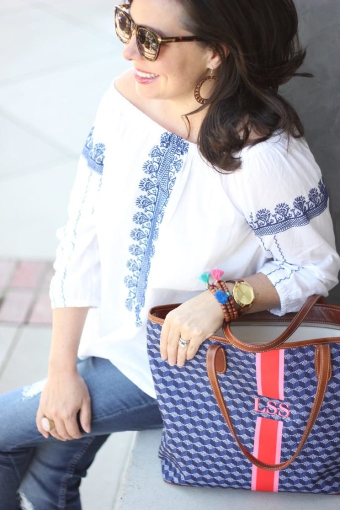 blue and white embroidered top
