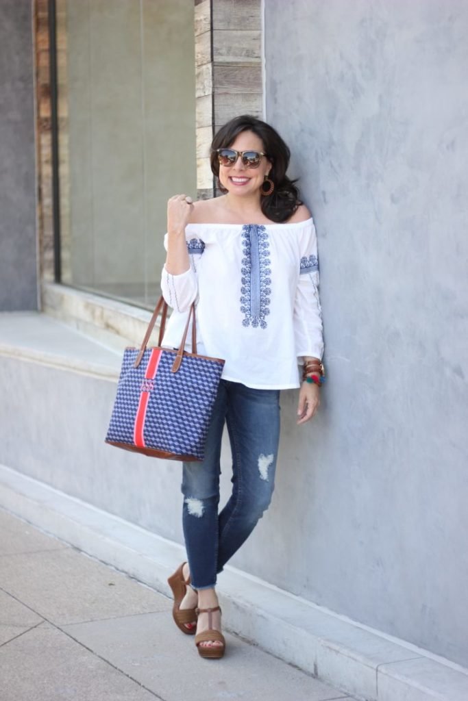 blue and white embroidered top