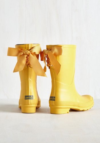 yellow rain boots with bows